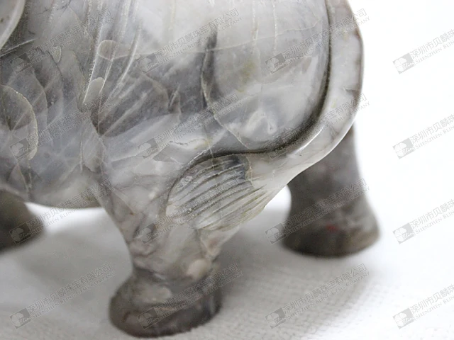 Stone carved elephant figurines.jpg