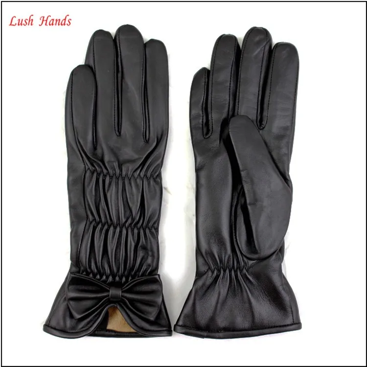 ladies cheap winter black kidskin leather hand gloves with bowknot