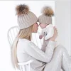 Warm winter good quality mum and baby pom pom hat set