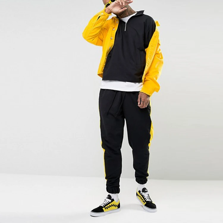 black joggers with yellow stripe