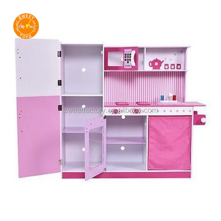 pink wooden play kitchen