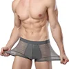 /product-detail/wholesale-cheapest-oem-newest-ice-silk-breathable-hollow-thin-sexy-men-s-boxers-62115975103.html