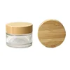 /product-detail/30ml-50ml-100ml-environmental-empty-bamboo-lid-glass-cream-jar-cosmetic-clear-glass-container-and-wooden-lids-60796443468.html