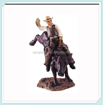 resin cowboy statues