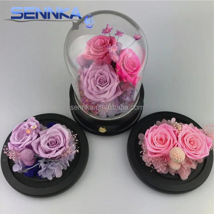 roses preserved in glass