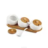 /product-detail/wholesale-tea-sugar-coffee-ceramic-canister-spice-storage-jar-with-spoon-60828862090.html