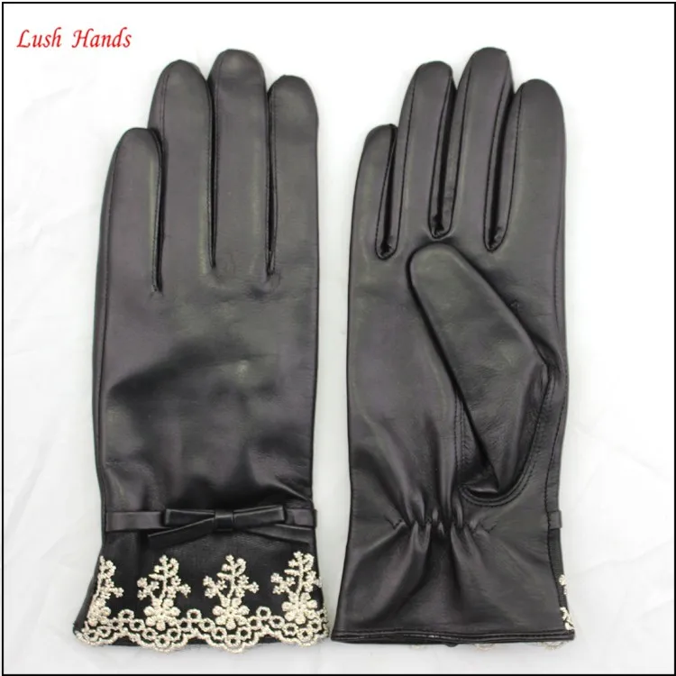 Hebei lxian goodluck glove factory Wholesale ladies black leather gloves and the cuff with white Voile lace
