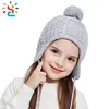 Wholesale Custom Children Beanie Toddler Ear Flap Beanie Unisex kids Winter Pom Pom Hat