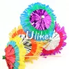 unusual fringed and layered Hawaiian party cocktail parasols in a mix of bright colours. for wedding table decoration