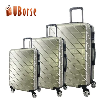 small hard suitcase on wheels