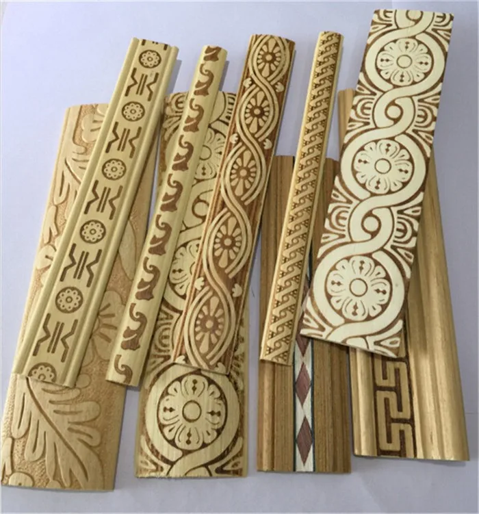 embossed white baseboard wood moulding