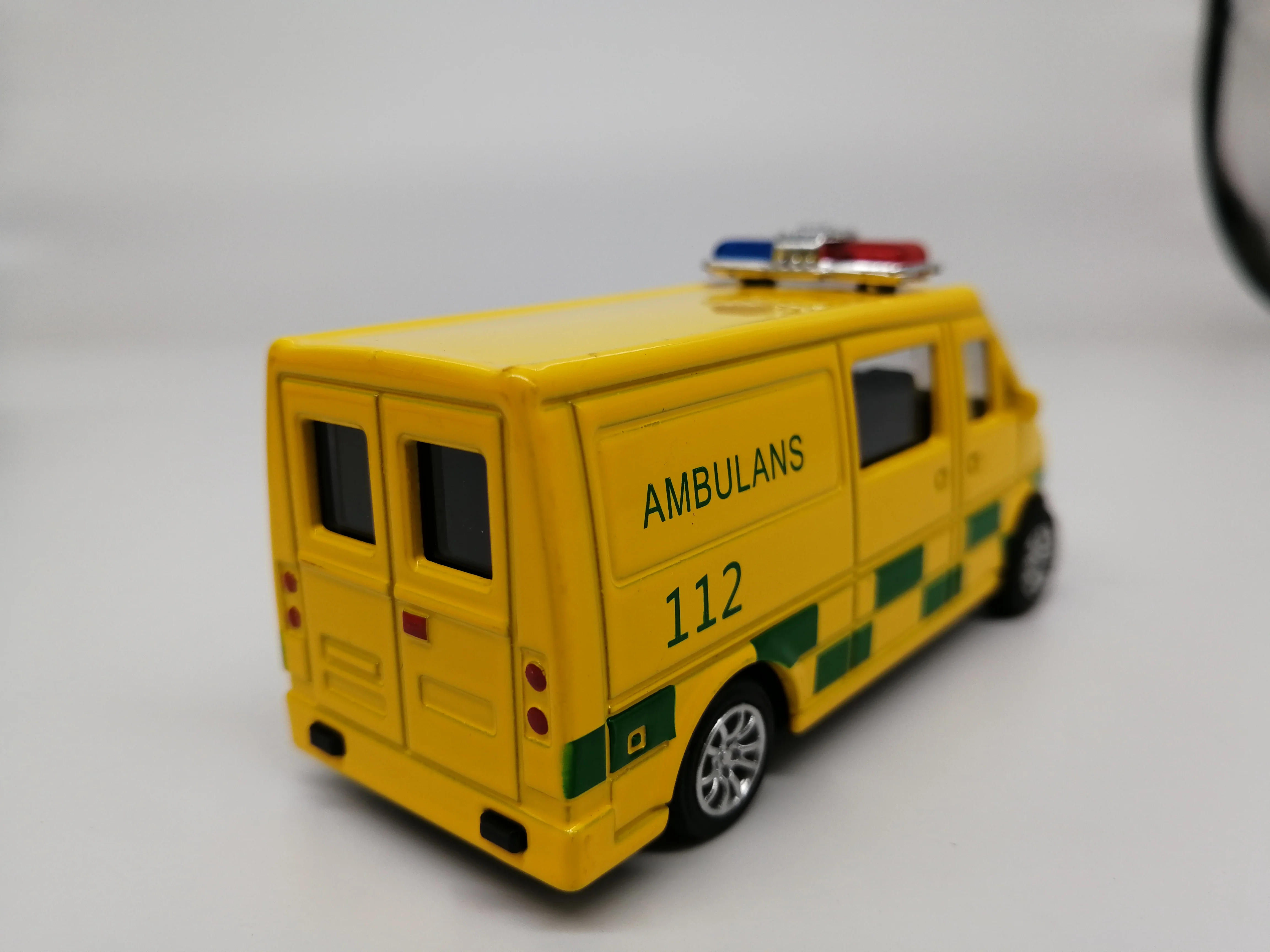 yellow ambulance toy