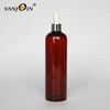 8 oz Amber PET Cosmo Round Bottles with 24 - 410 Neck Finish Black Smooth Skirt Disc Top Cap