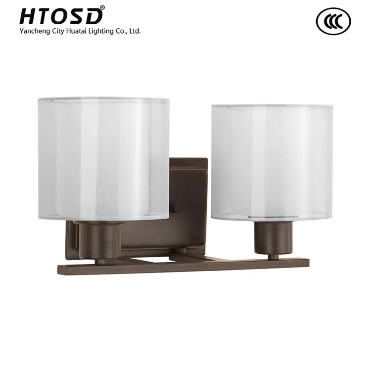 Htbv0025 Two Light Bath Fixture With Inner Gl Globe Encircled By Htbv0025 Two Light Bath Fixture With Inner Gl Globe Encircled By A Translucent Sheer Mylar Shade