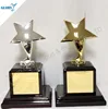 star shape metal trophy with wooden base award