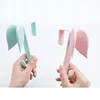 plastic angle wing coat hook behind the door