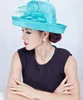 Ivory,blue and orange colors,royal church fascinator hats,sinamay and feather material