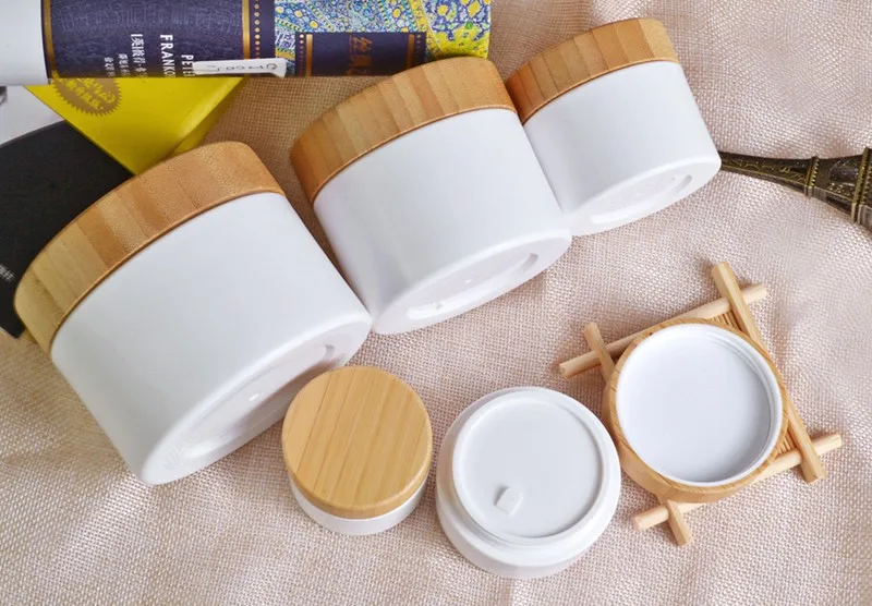 30g 50g 100g 150g 200g 250g 白色塑料硬质宠物化妆品带竹盖容器瓶的