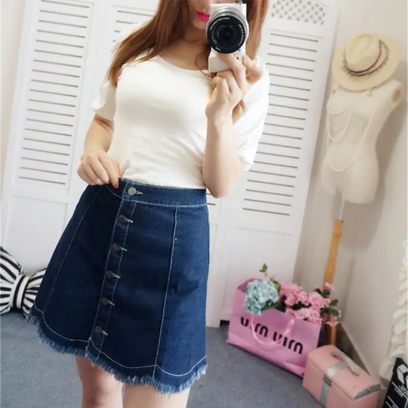 Adorable chick wears a very short jean skirt on cam