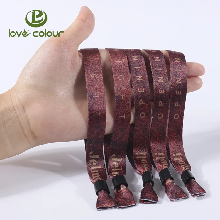 Fabric Wristband With One Time Use Locks