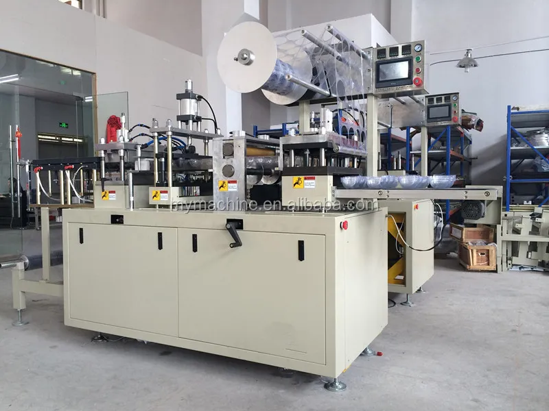 Plastic Lid Machine workshop.jpg