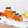 Wholesale Hexagon Glass Jar Storage 100ml 180ml 280ml 380ml Six-Rowed Glass Honey Jar With Metal Cap