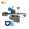 China Supplier automatic school uniform paging flat labeling machine