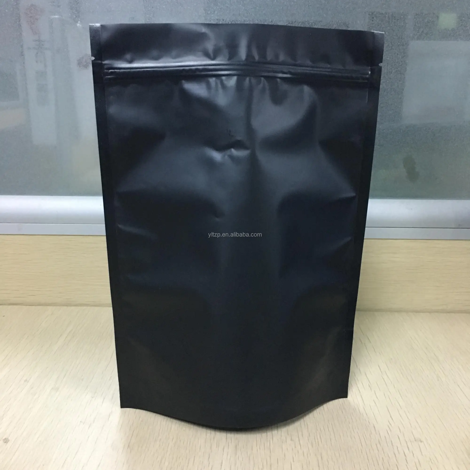 black zip bag