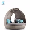 Tropical round cocoon shaped outdoor sunbed with rattan covered and canopy beach lounge