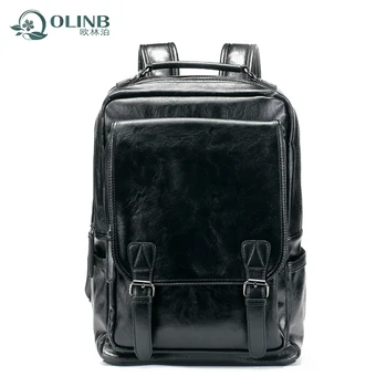 black leather backpack with laptop sleeve