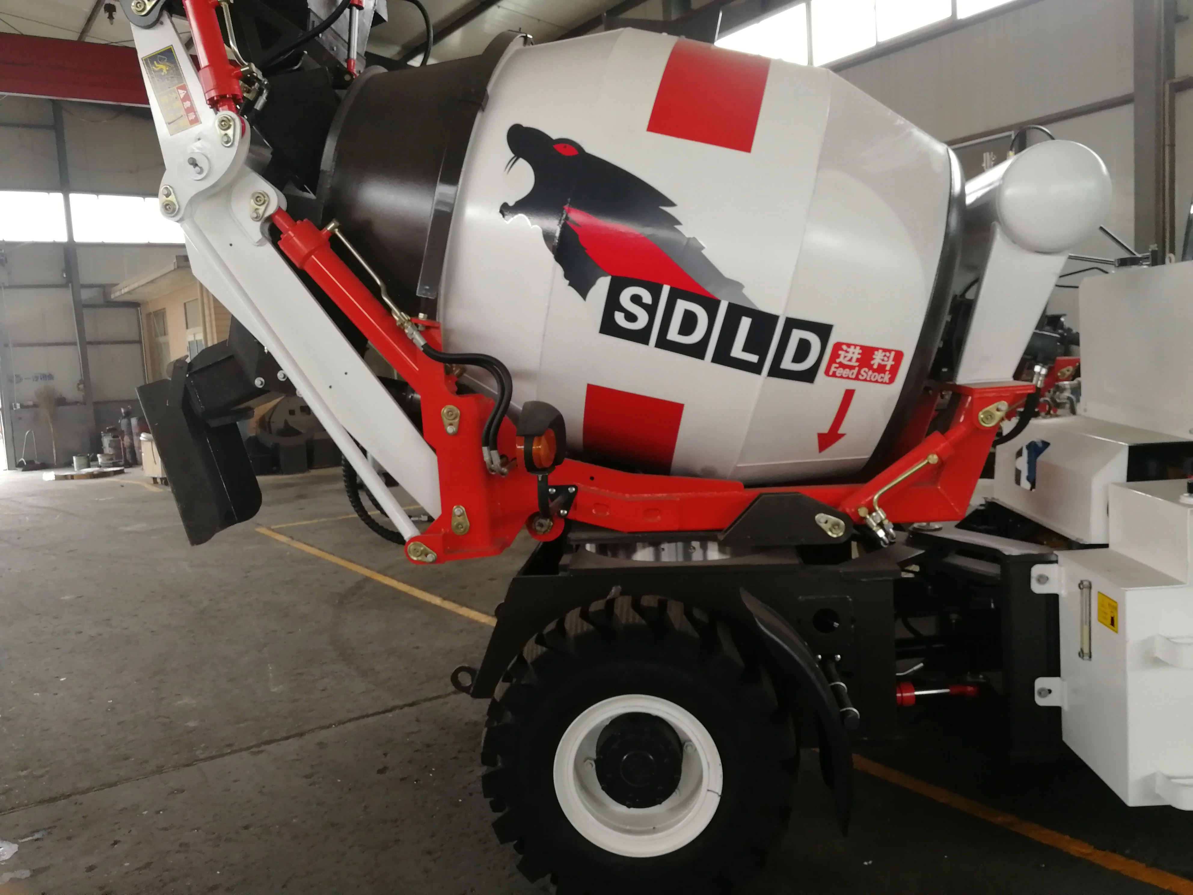 self-loading concrete mixer,automatic feeding tank agitator mixer ,dumper concrete mixer can make the working efficiency higher