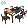 Wholesale wooden frame black dining table burning stone kitchen table for family dinner