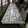 10kg1050-50-0.426mm sandstone surface up and wood grain down eps sandwich roof panel