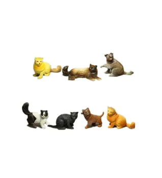 small plastic toy cats
