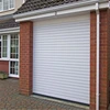 Garage door entry for spring mount garage door opener