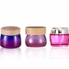 /product-detail/luxury-5g-10g-15g-30g-50g-100g-round-cosmetic-glass-cream-bamboo-jar-with-wooden-cap-60756952601.html