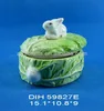 Vegetable shaped ceramic bread box with rabbit