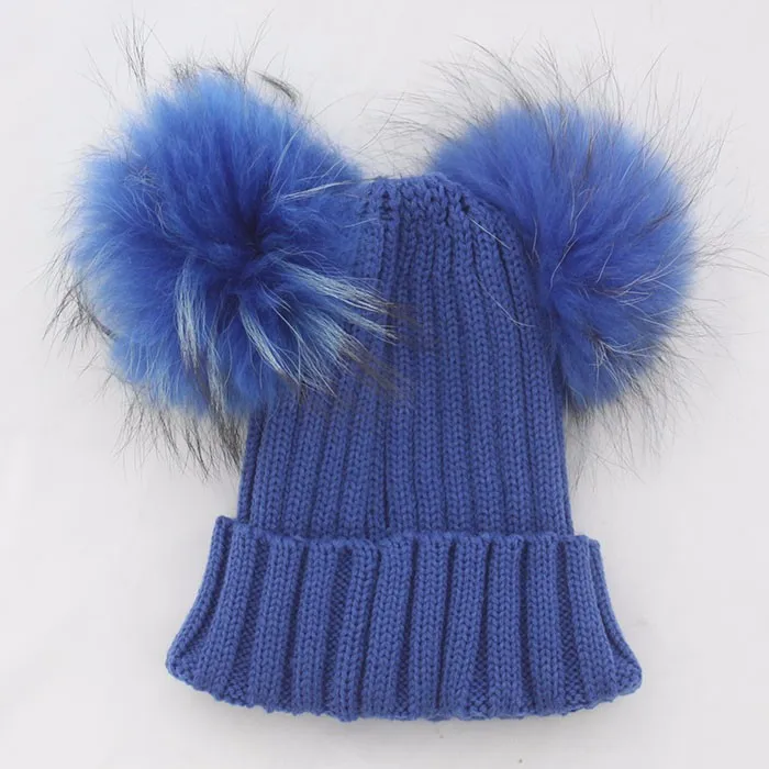 blue hat with pom pom