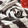 China supplies wholesale women clothing stripe faux printed suede fabric