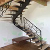 bespoke centre spine steel structure curved stairs with wood tread
