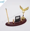 New design desktop with metal eagle statue on wooden base
