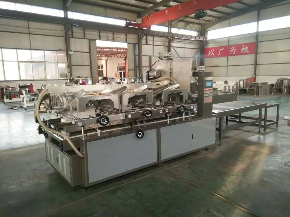 Corrugated Cardboard partition assembler machine.jpg