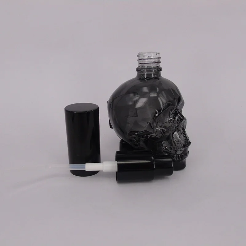 Clear Black 30ml 60ml Glass Skull Bottle With Spray Pump For Perfume