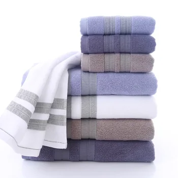 white cotton bath towels