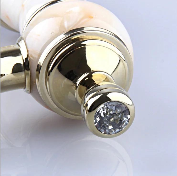 The new luxury jade exquisite diamond art ceramic faucet bathroom cabinet basin faucet hot and cold