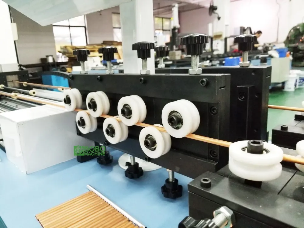 Automatic Copper Aluminum Tube Straightening and Chip-less Cutting detail photo BOBO Machine automatic copper aluminum tube straightening and chip-less cutting shown in a detail photo for this news article