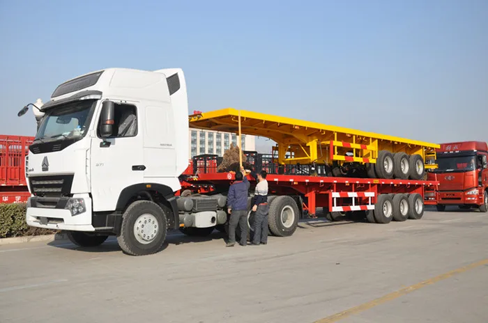 Huayu 3 Axle 40/50/60 Ton 40FT Truck High Bed Flatbed Container Semi Trailer