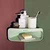 Punch-free bathroom wall-mounted triangle plastic storage rack
