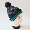 Knit pattern cable beanie hat with satin lining with pom