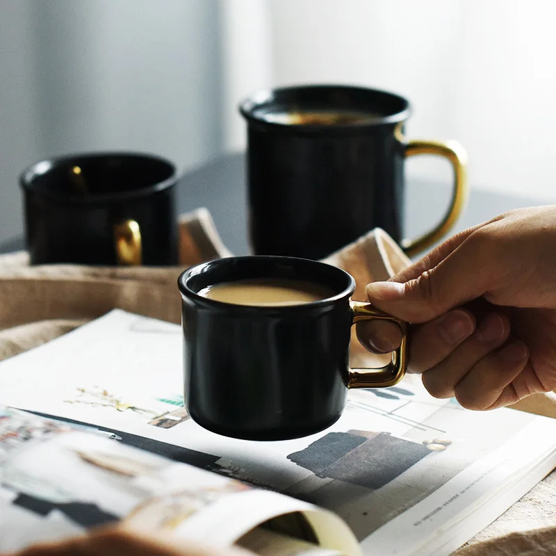 Hot selling black glazed ceramic coffee mug with golden handle